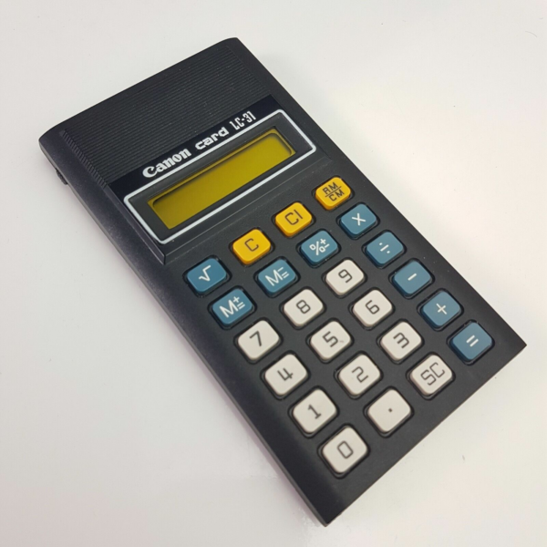 Nice Vintage c.1980 Canon Card LC-31 Calculator + Manual & Plastic holder Japan