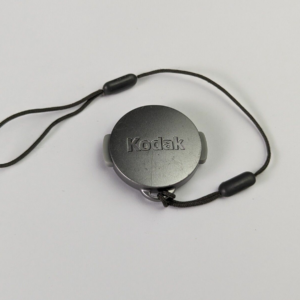 Kodak Lens Cap from Kodak Easy Share CX4310 21mm Camera + Strap